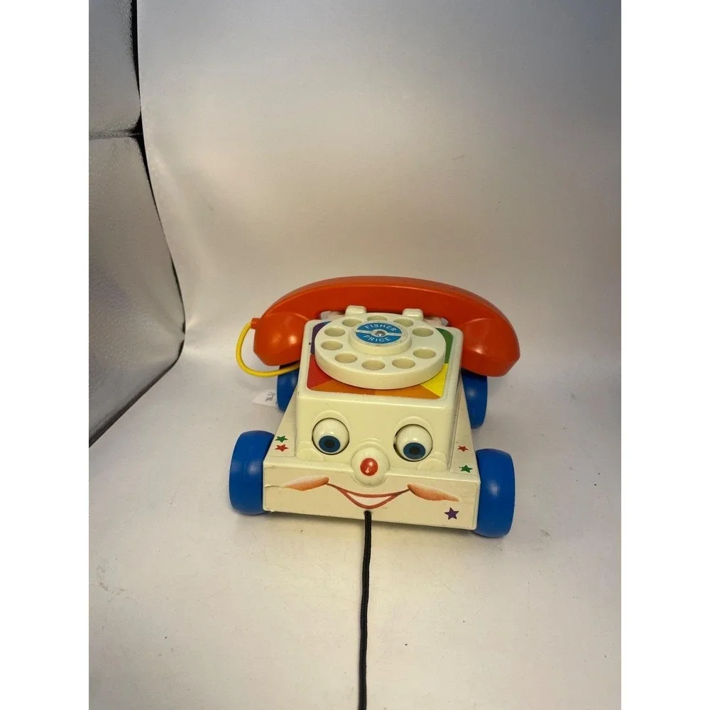 2009Fisher Price Chatter Telephone Toy Rotary Clicking Phone Moving Eyes Classic